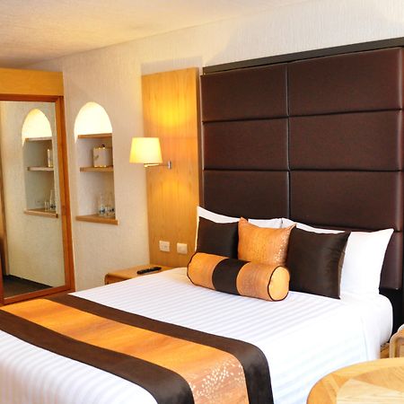 Royal Pedregal Hotel Ciudad de México Exterior foto A bedroom at the hotel